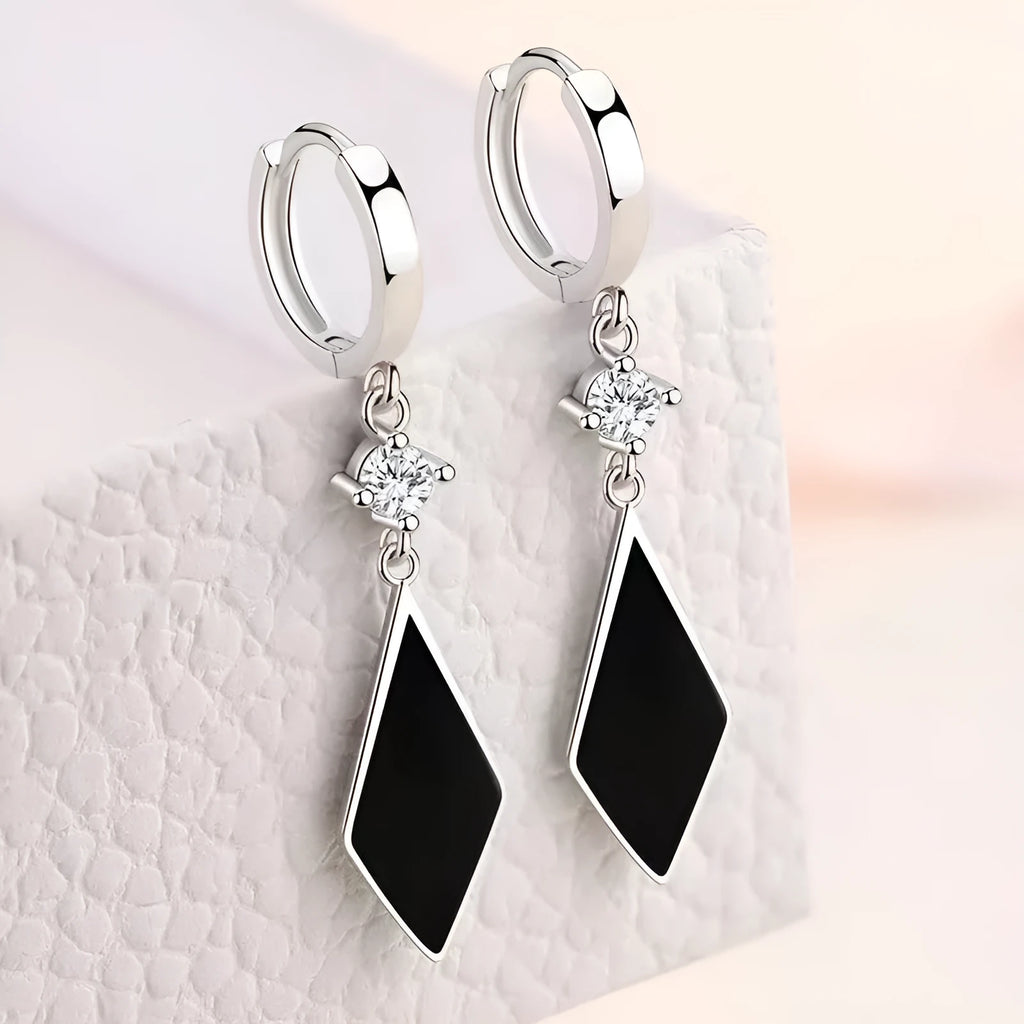 Silver vintage geometric diamond-shaped clip earrings for women.