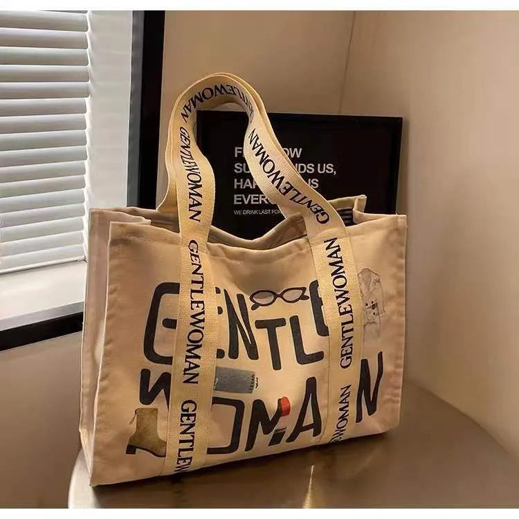 Large canvas women's tote bag with printed design, shown in available colour and pattern options