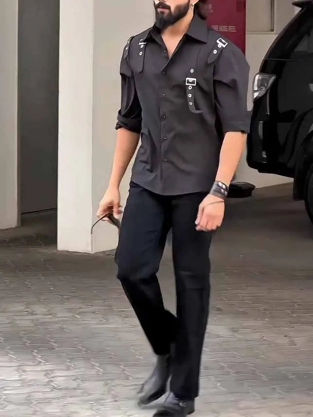 Men's black utility-style button-up shirt with a regular fit on a model.