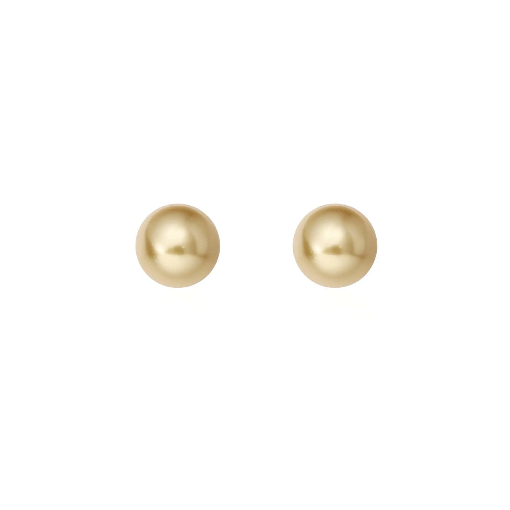 A pair of large silver pearl stud earrings with an eight-pointed star geometric design on a white background.
