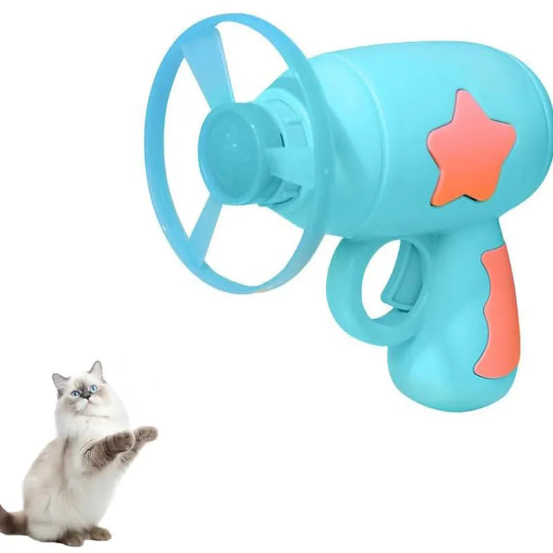 Blue plastic cat toy gun with spinning frisbee for indoor feline entertainment