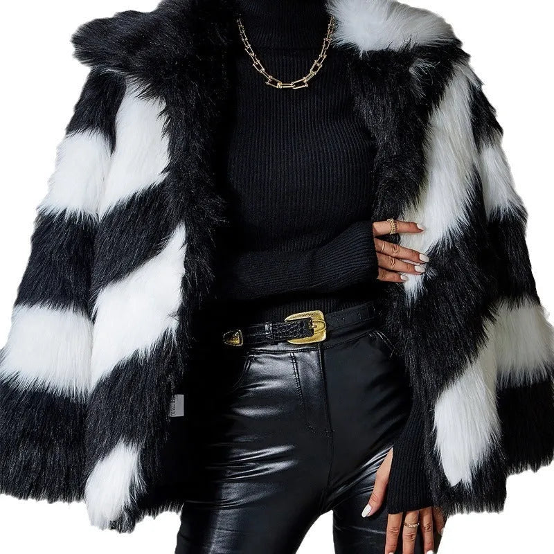 Women's lapel contrast colour coat with faux fur collar in picture colour, shown on model.