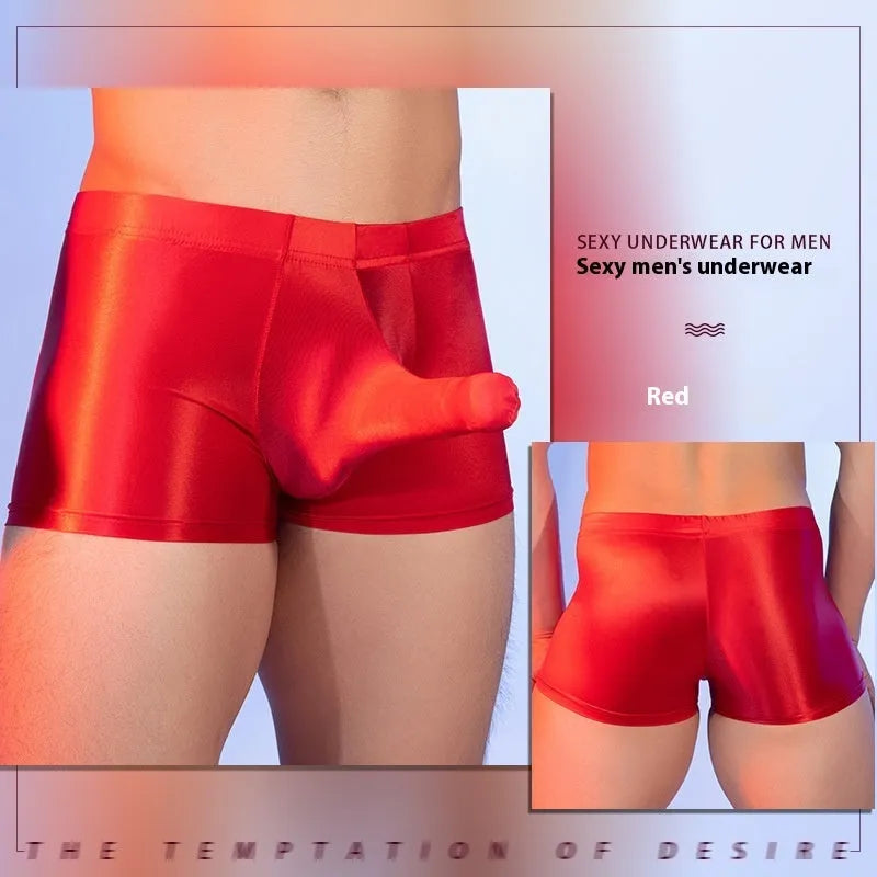 Men's red nylon elephant nose boxer shorts on a white background.