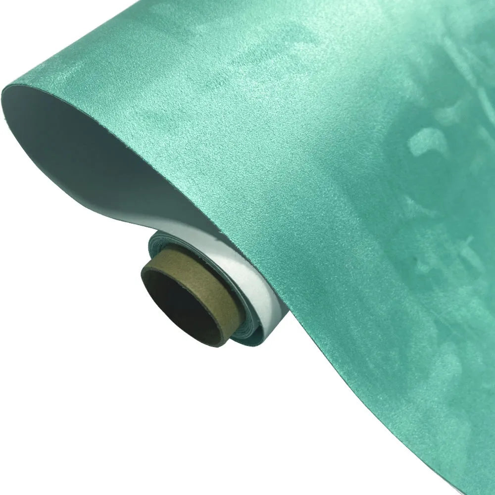 Self-adhesive leather suede sheet showing texture and colour options for DIY projects