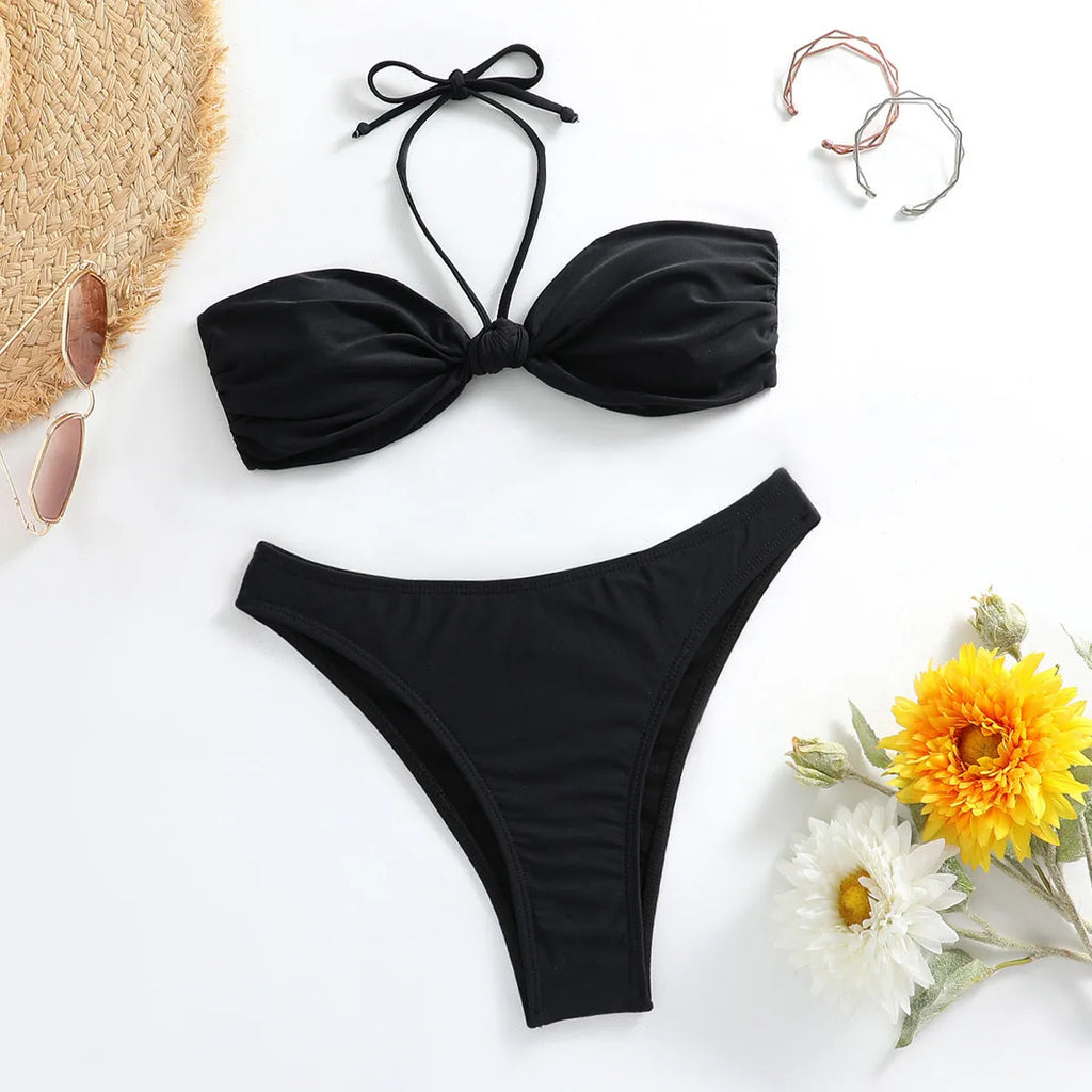 Black polyester women's bikini set with lace-up tube top and briefs swim bottoms
