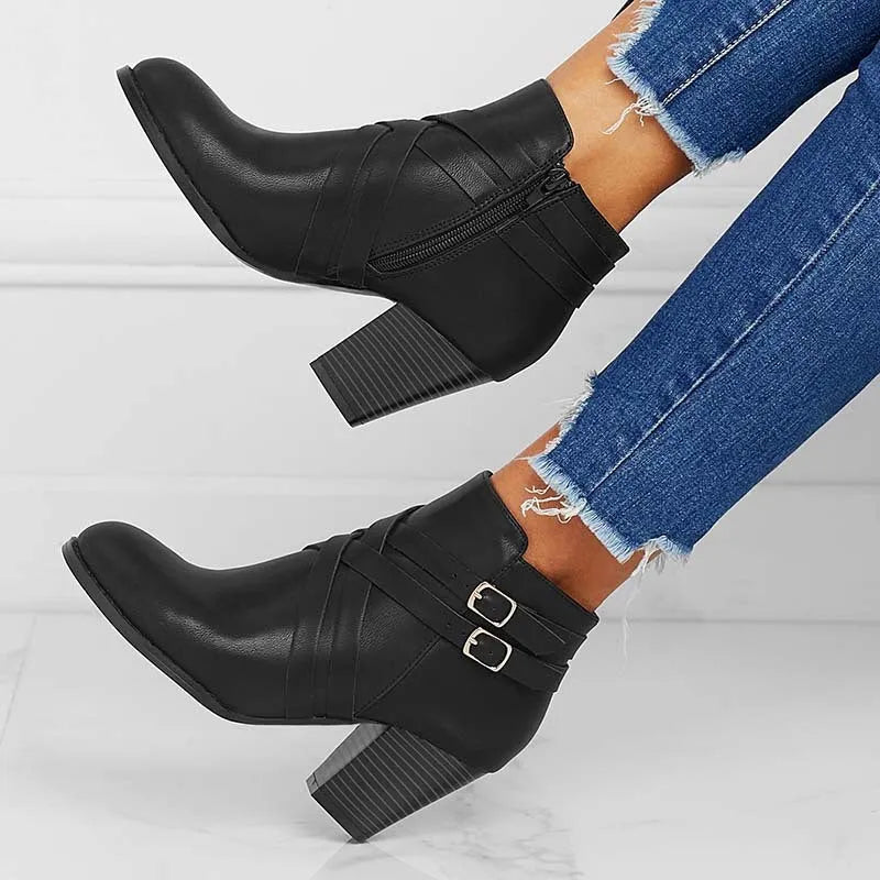 Women's plus size grey ankle boot with a 7cm heel and side zipper.