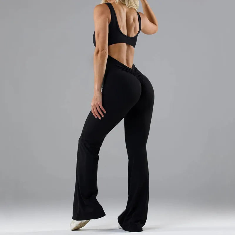 Women's black yoga bodysuit with hollow seam design and built-in chest pads
