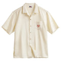 Light apricot men's Cuban collar shirt with bamboo plant and floral pattern