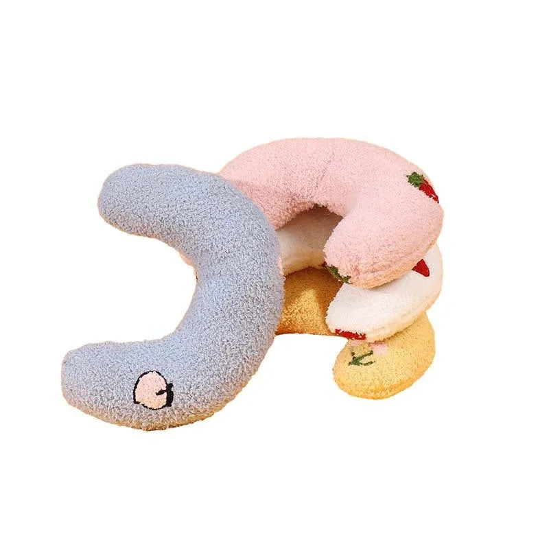 Blue half moon U-shaped cat pillow with cartoon dog and cat design for pet crates.