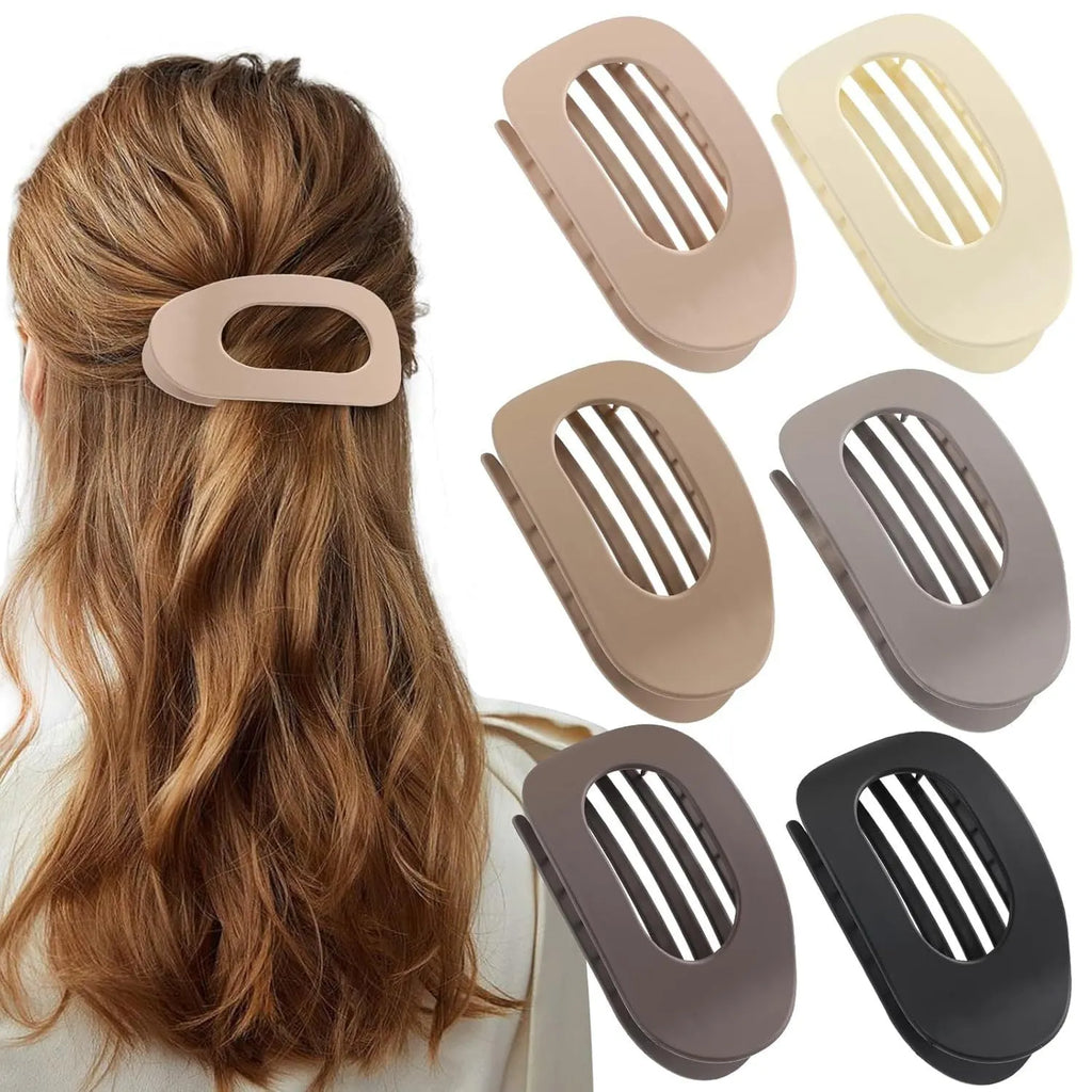 Set of six rose red nude coloured women's plastic hair clips with quadrilateral design on a white background.