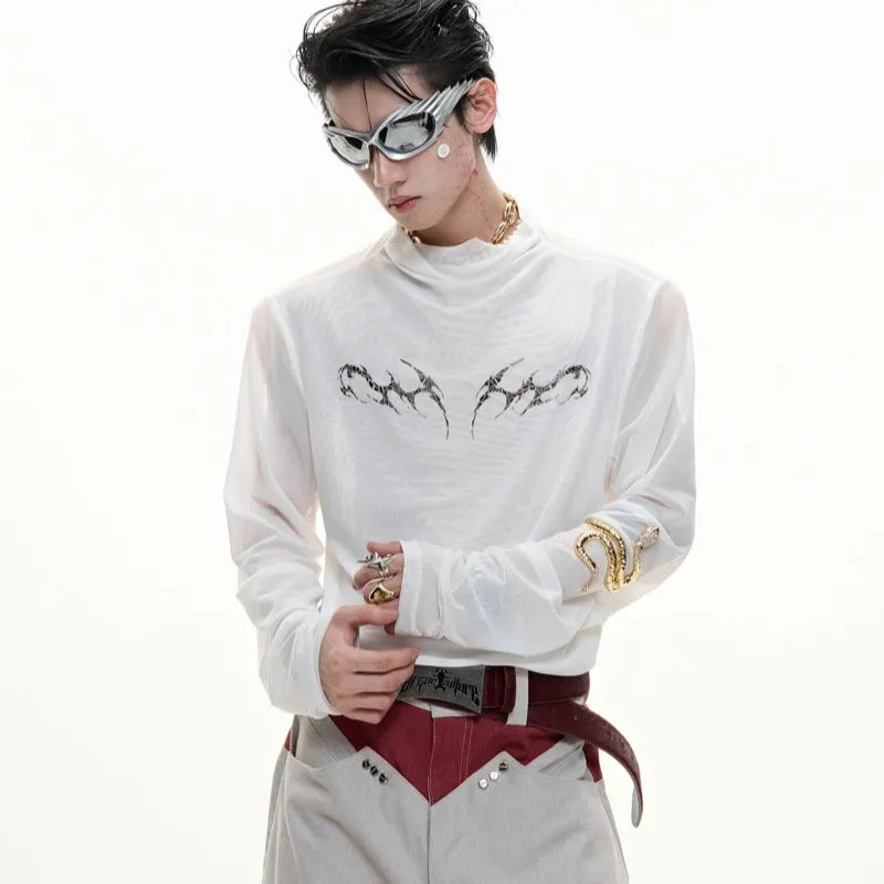 Man wearing a black slim fit long sleeve mesh base layer shirt.