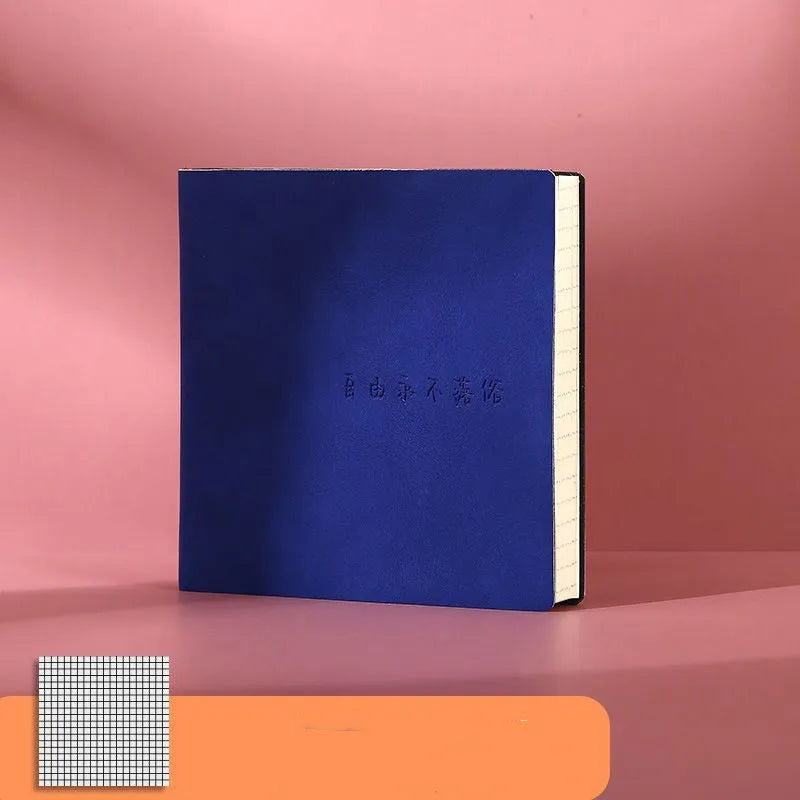 Square A5 mesh leather notebook in avocado green with French fold binding open on blank pages