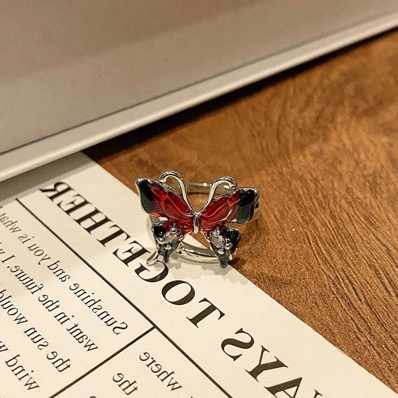 Copper Chinese butterfly women's ring showing creative design with oil dripping treatment finish