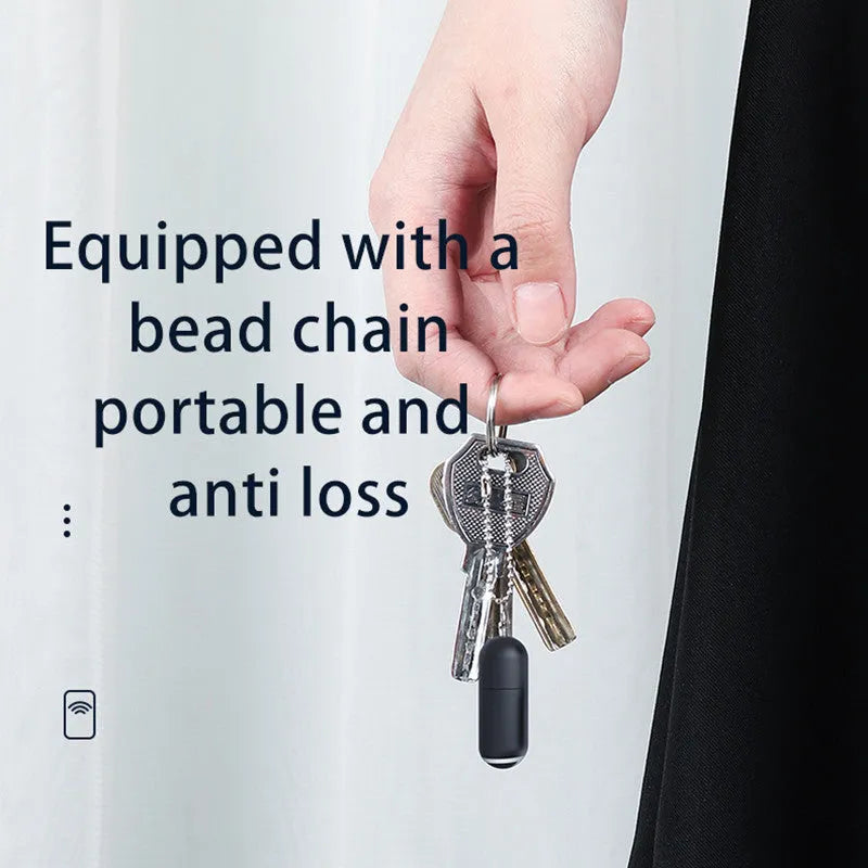Black universal infrared remote control emitter capsule for smartphone Lightning, Type-C, and Micro USB ports.