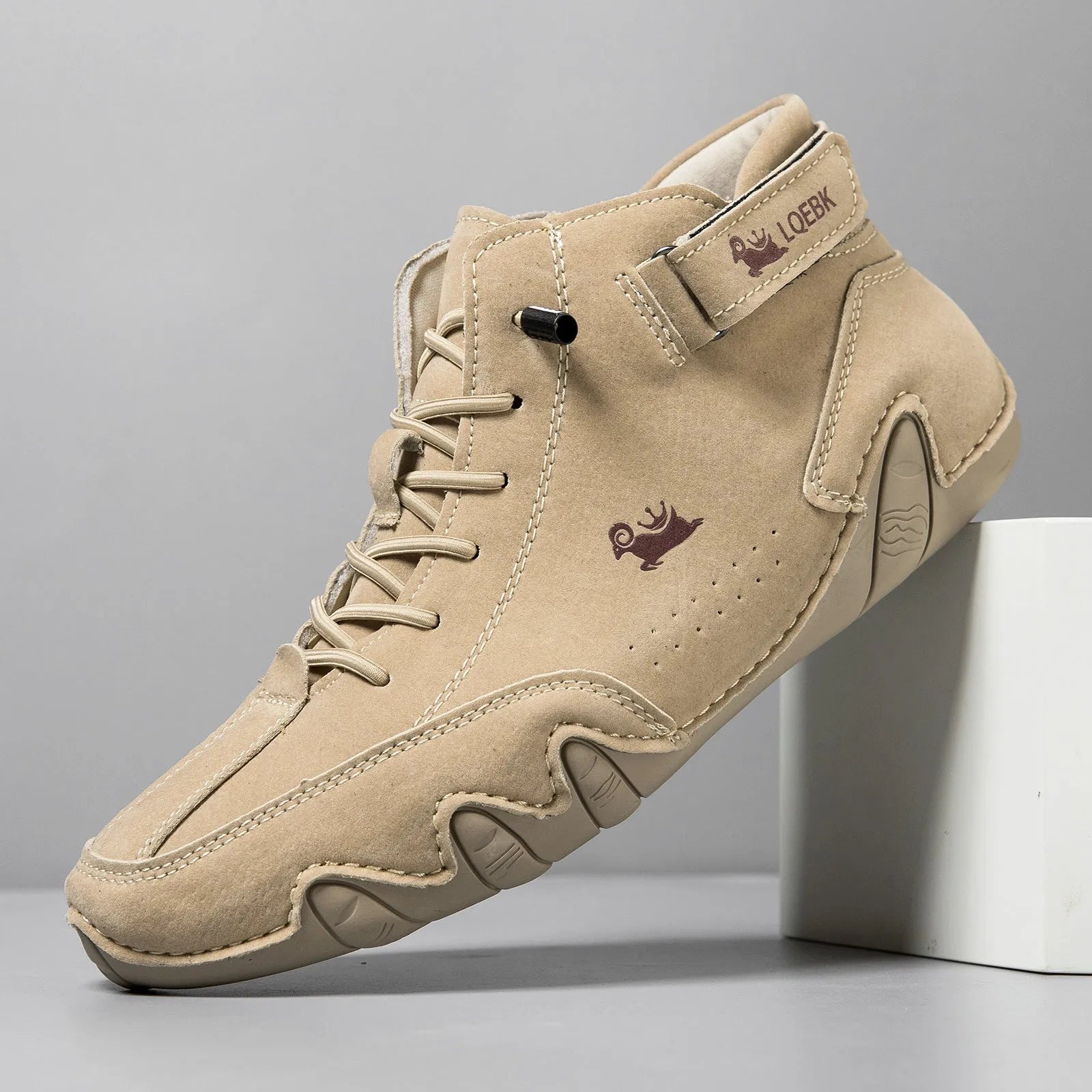 Men's brown high-top octopus Martin boots with a round toe and visible stitching on a flat rubber sole.