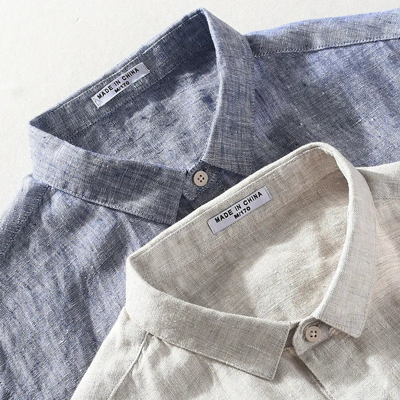 Men's raw jute coloured linen short sleeve shirt with a square collar laid flat.