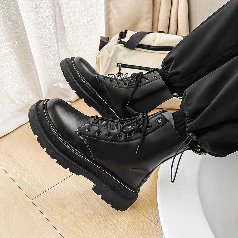 Men's black platform ankle boots with 8-eye lacing and a side zipper on a rubber sole.