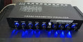 Black car audio EQ equaliser and frequency division amplifier with control panel and connection ports