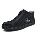 Men's black slip-on casual loafers with a round toe and rubber sole on a white background.