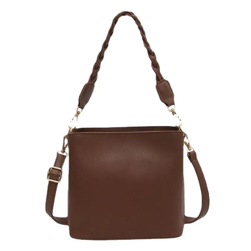Retro woven PU bucket bag in khaki colour shown as crossbody and underarm bag