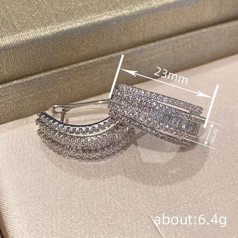 White gold colour geometry stud earrings with inlaid zircon details on copper bases
