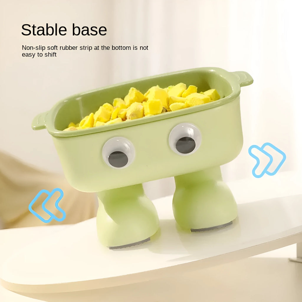 Green robot-shaped elevated cat bowl with tilted design and detachable inner dish