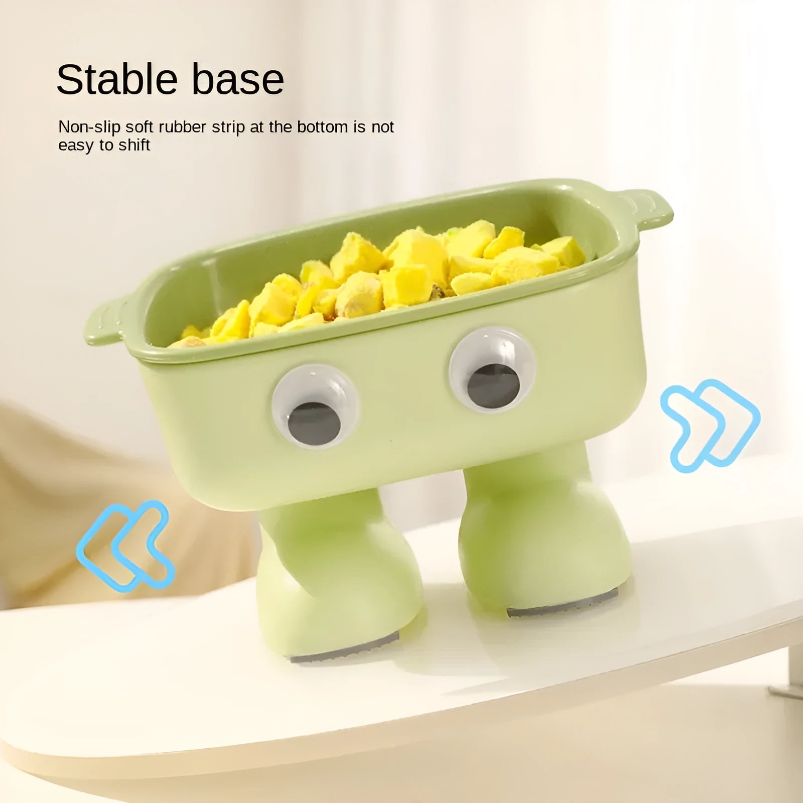 Green robot-shaped elevated cat bowl with tilted design and detachable inner dish