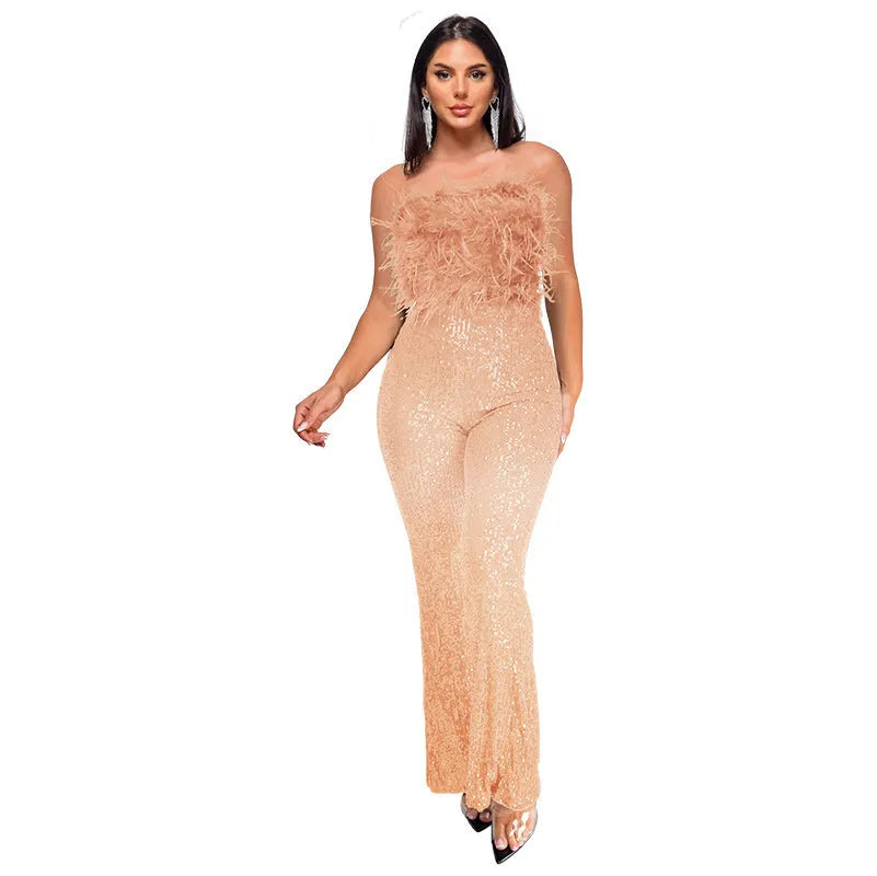 Women's sleeveless backless jumpsuit with flared legs in a champagne colour.