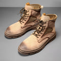 Men's vintage Martin boots in black with a frosted microfiber leather upper and thick rubber sole.