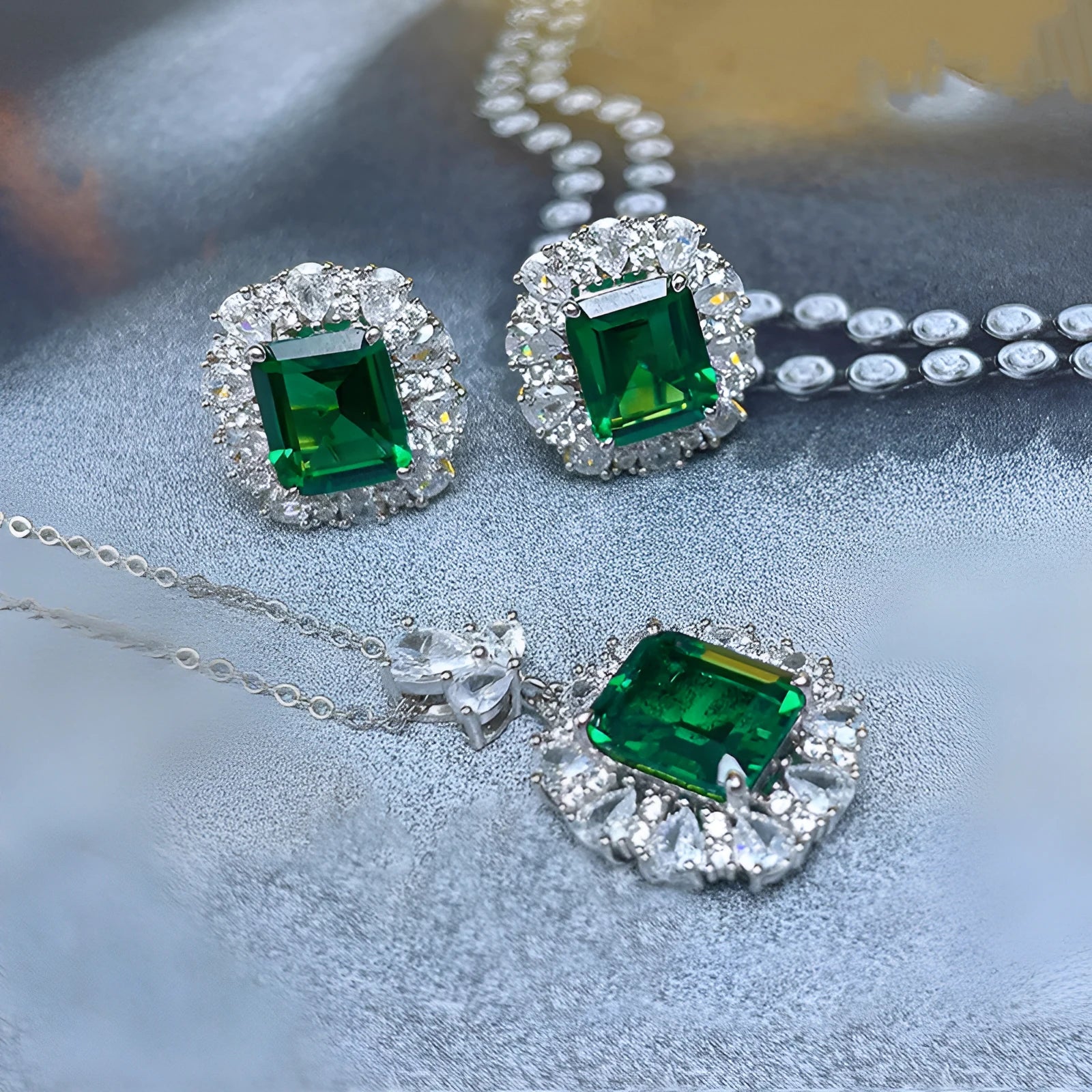 Women's French royal style jewellery set in copper with botanical pattern, showing necklace, earrings, and ring.