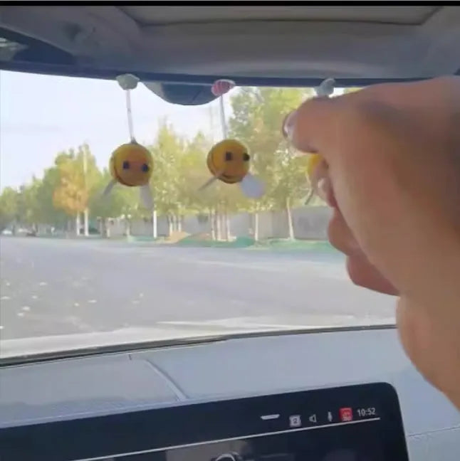 Swing Spring Bee car dashboard decoration showing cartoon bee design on fur ball material