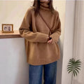 Women's loose red turtleneck sweater with thick curling pile collar, casual style.