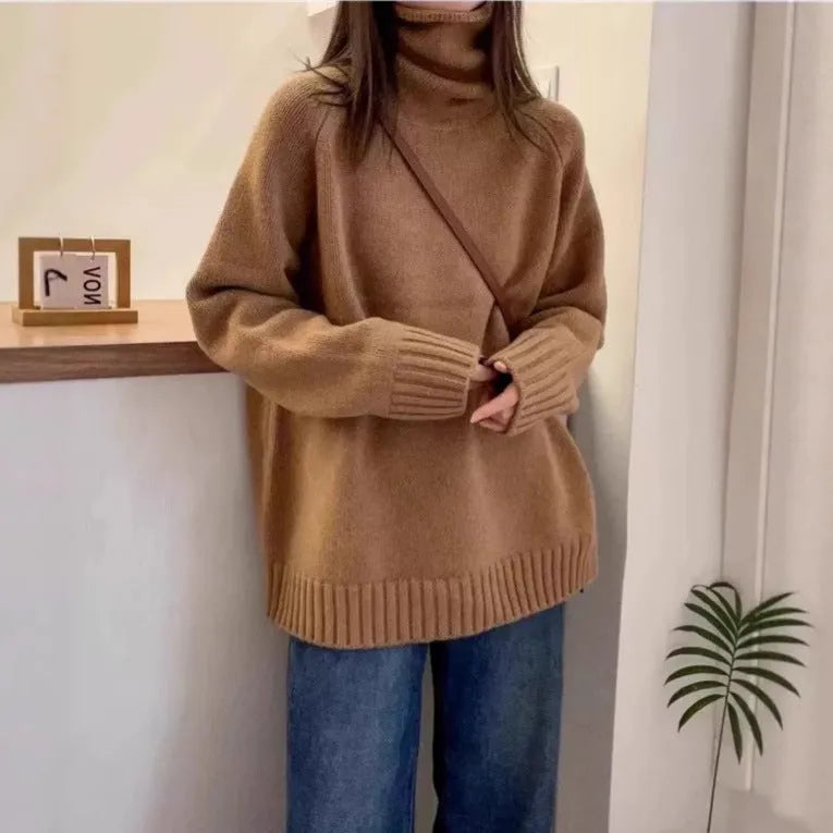 Women's loose red turtleneck sweater with thick curling pile collar, casual style.