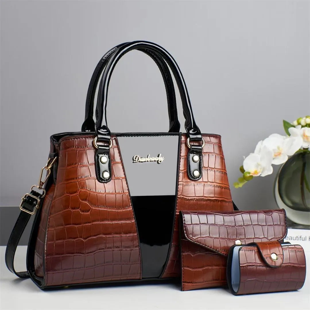 Women's crocodile-stitch three-piece shoulder bag set showing main bag, small bag, and card pouch in PU leather
