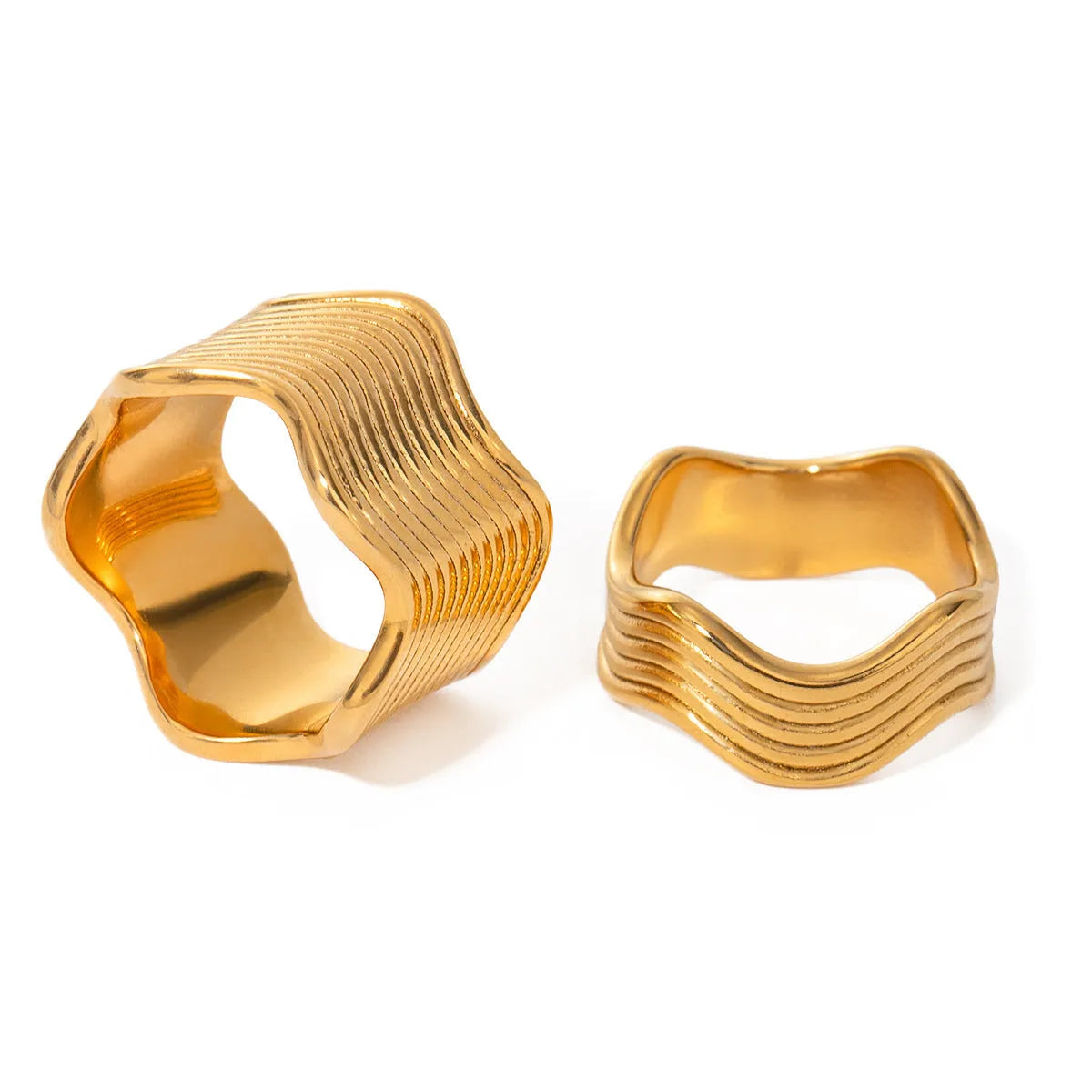 Stainless steel wide band ring with geometric wave pattern design