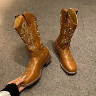 Brown women's mid-calf boots with embroidered pattern, square heel, and leather lining