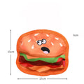 Hamburger-shaped dog toy with bright colours featuring crinkle and squeak sounds for interactive play