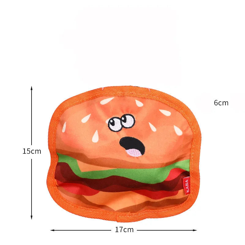 Hamburger-shaped dog toy with bright colours featuring crinkle and squeak sounds for interactive play