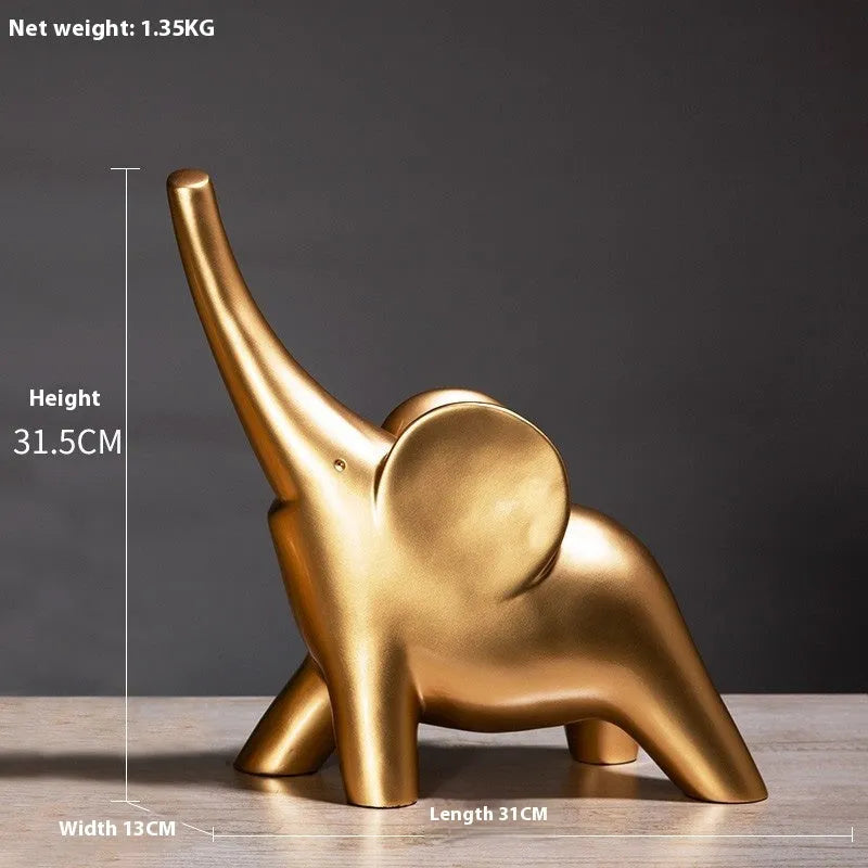 Modern resin elephant ornament in rose gold colour displayed on wooden surface