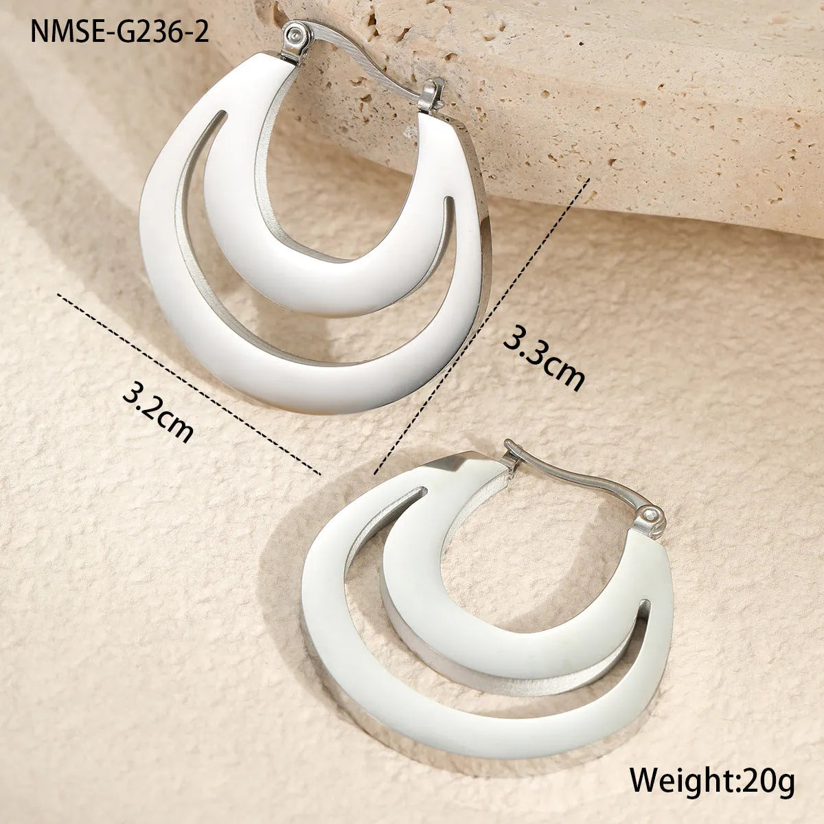 Geometric French earrings with circular ring elements in 18K gold plated metallic finish