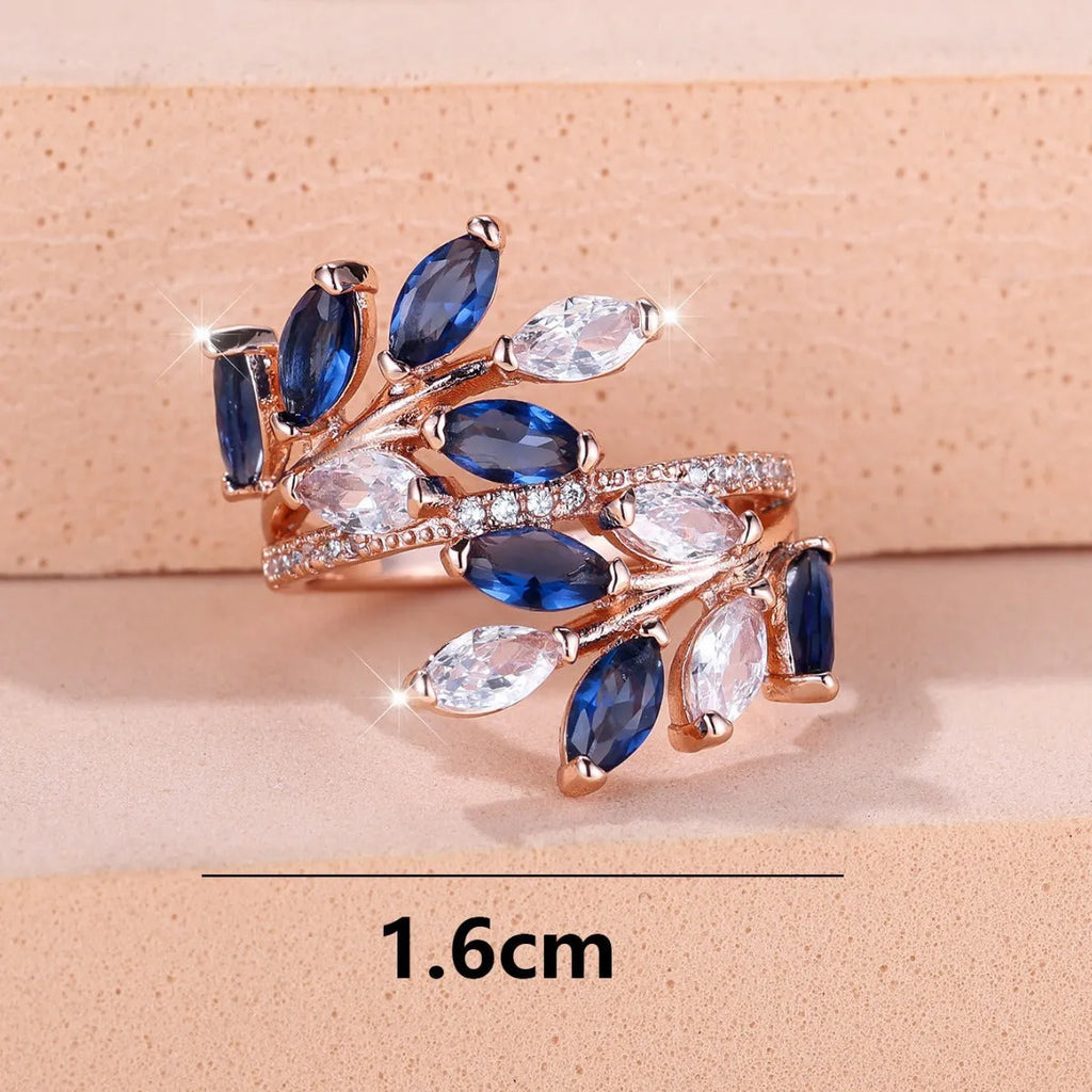 Adjustable copper leaf ring with a horse eye zircon stone in a choice of nine colour finishes.