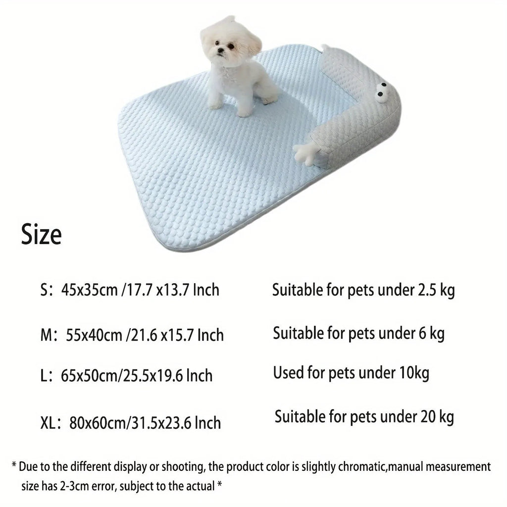 Blue pet cooling mat with big-eyed monster design on a wooden floor, shown in large (L) size.