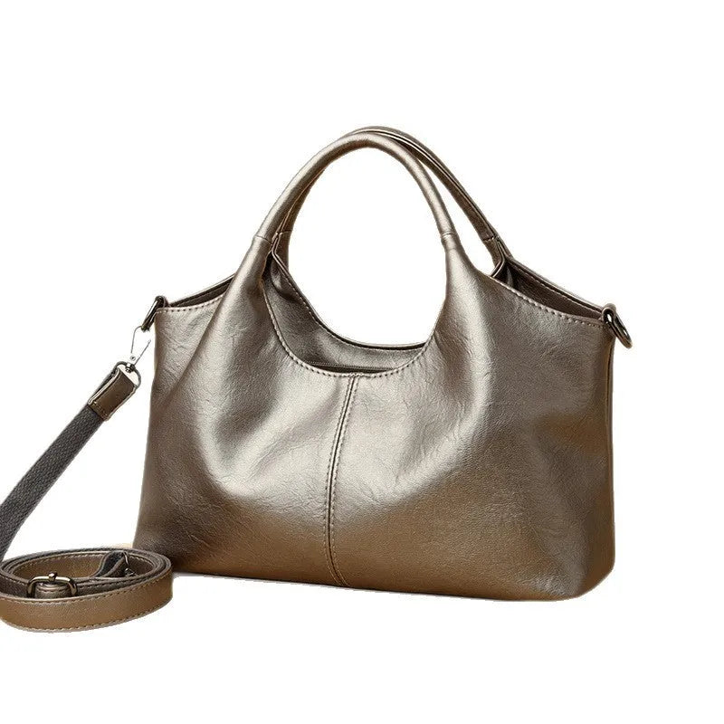 Genuine leather women's cross-body bag in black with soft texture and large capacity design