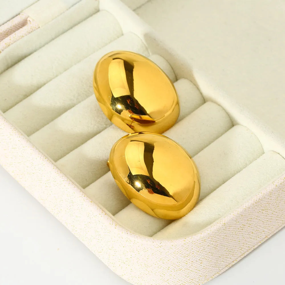 Geometric line ear studs with gold electroplated finish and glazed surface
