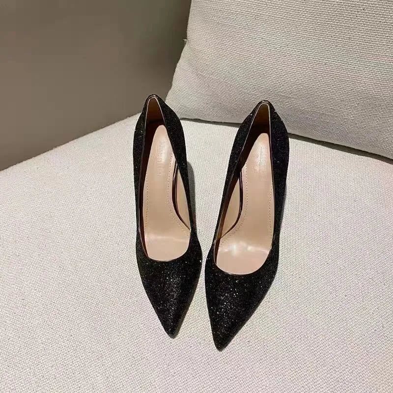 Women's silver PU leather bridal shoes with crystal detail on a stiletto heel.
