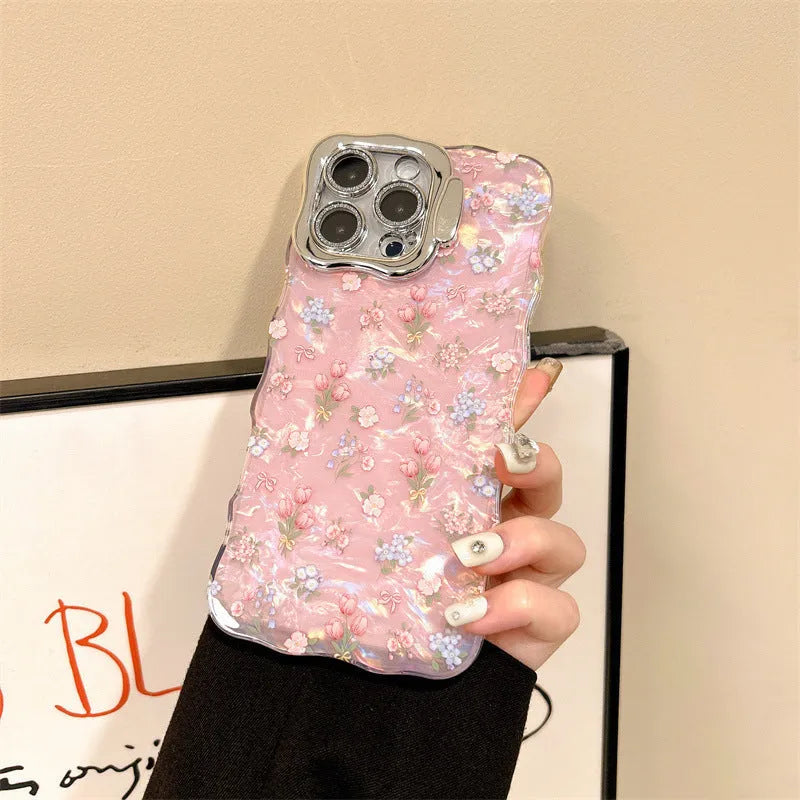 Wave white acrylic iPhone case with embossed floral shell pattern and invisible bracket on a plain background