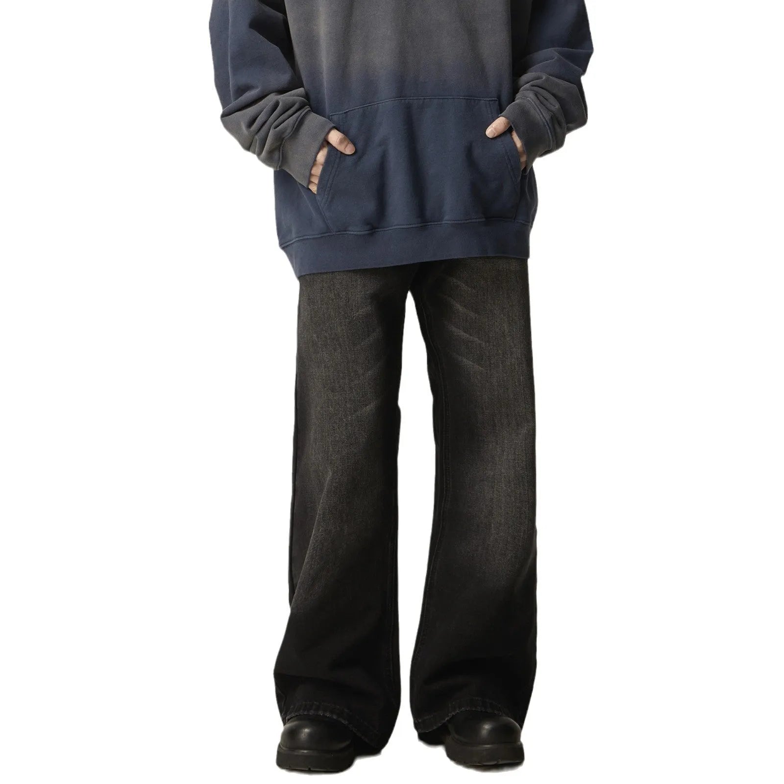 Black loose straight-leg retro jeans on a hanger, showing the front view with zipper fly.