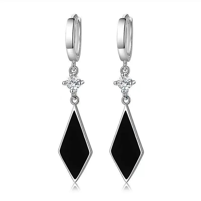 Silver vintage geometric diamond-shaped clip earrings for women.