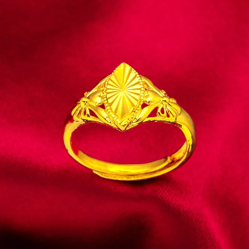 Alluvial gold open diamond flower ring with geometric textured design on brass with electroplated finish.