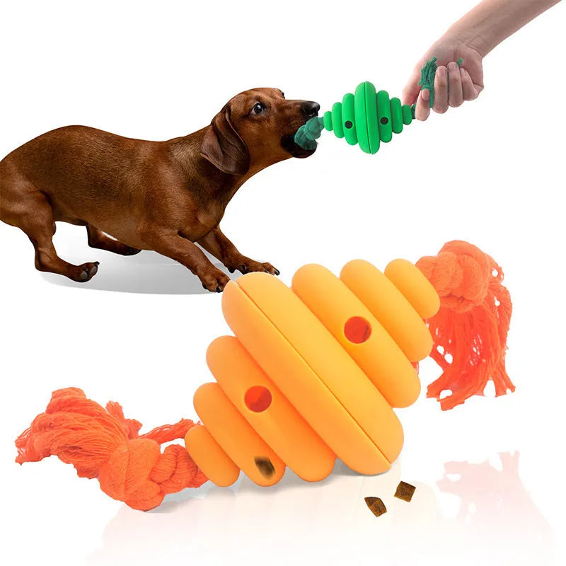 Large green and yellow silicone dog toy with a knotted rope and hollow ball for food dispensing.